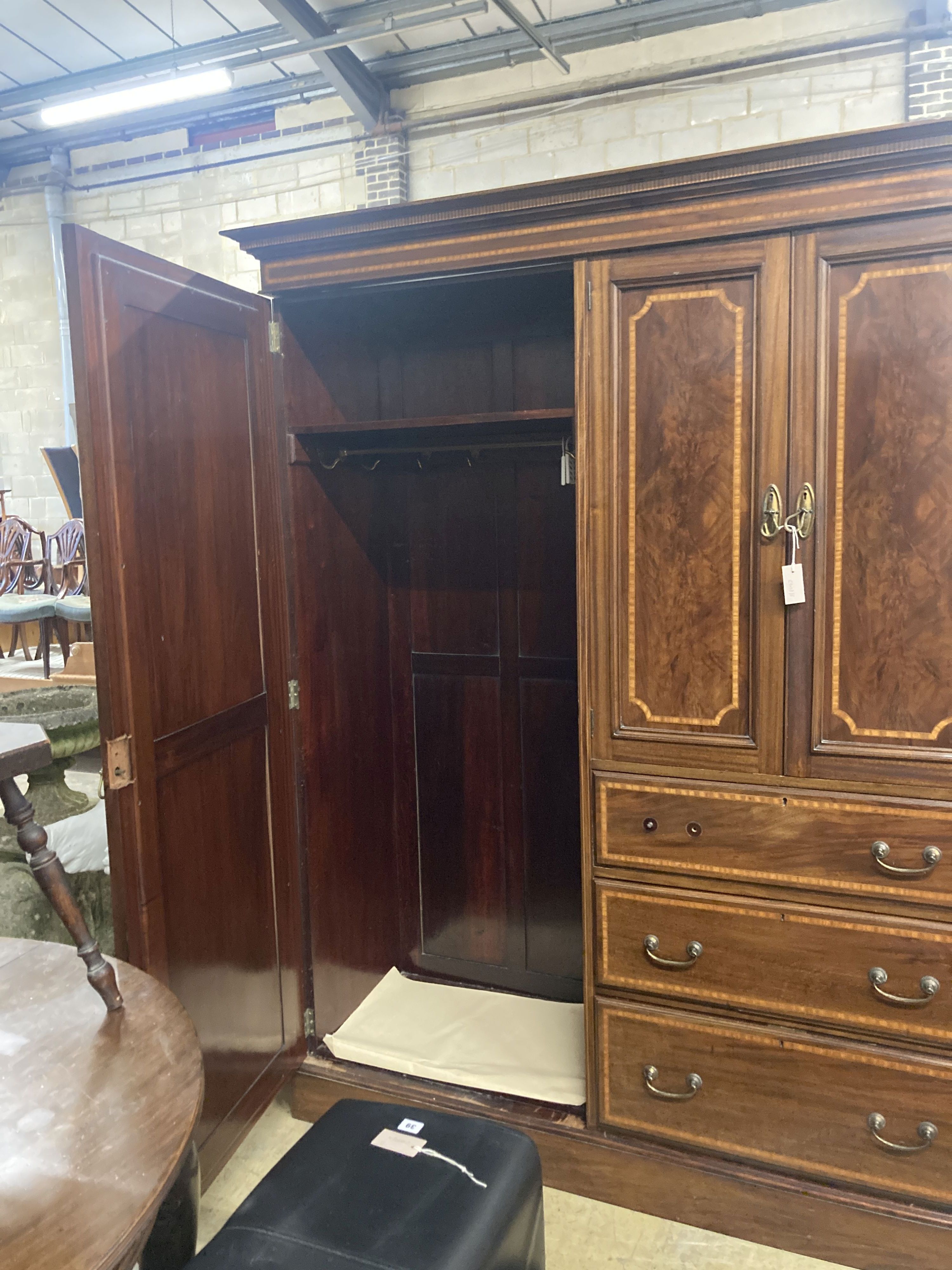 An Edwardian satinwood banded mahogany wardrobe, width 160cm, depth 56cm, height 206cm